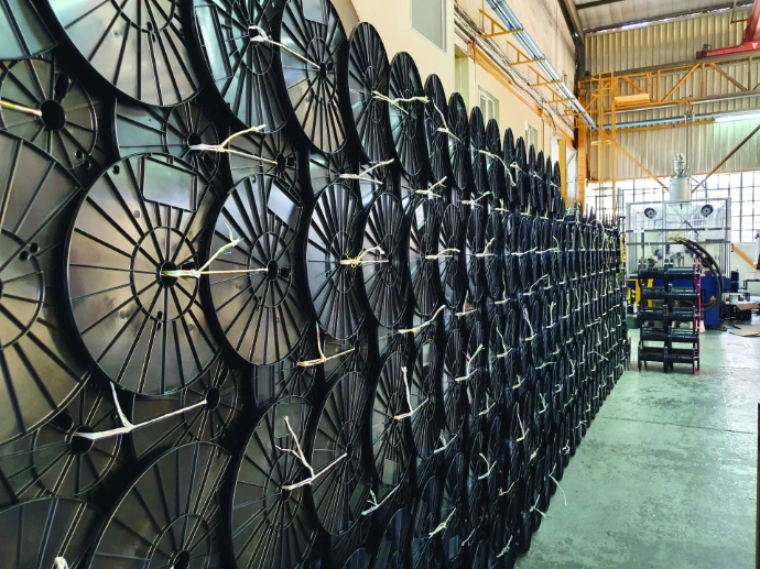 Plastics reels on a factory floor